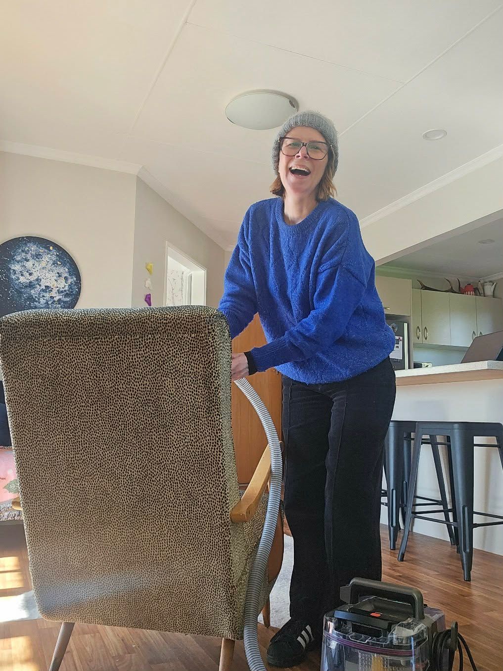 collette from ettelloc cleaning a chair vintage furniture restoration piece